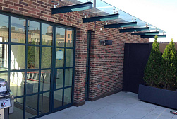 Консольные козырьки и навесы в Красноярске. Готовые проекты ПерилаГлавСнаб - фото 13